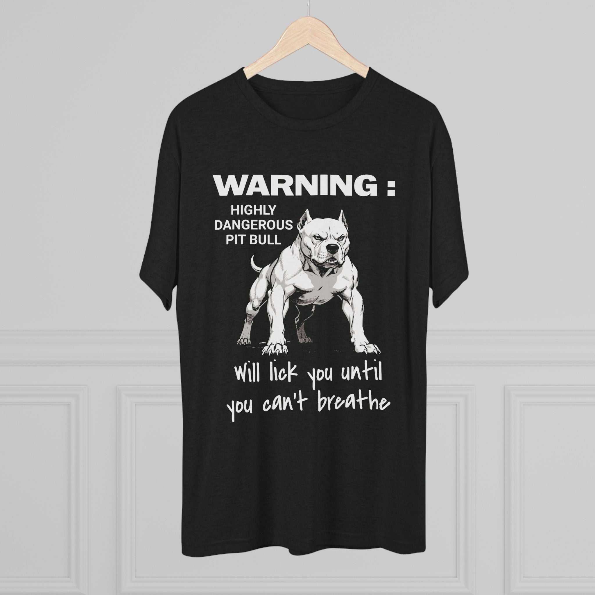 Charcoal Pit Bull Warning T-Shirt with playful "Highly Dangerous Pit Bull Will Lick You Until You Can't Breathe" white print and detailed pit bull illustration.