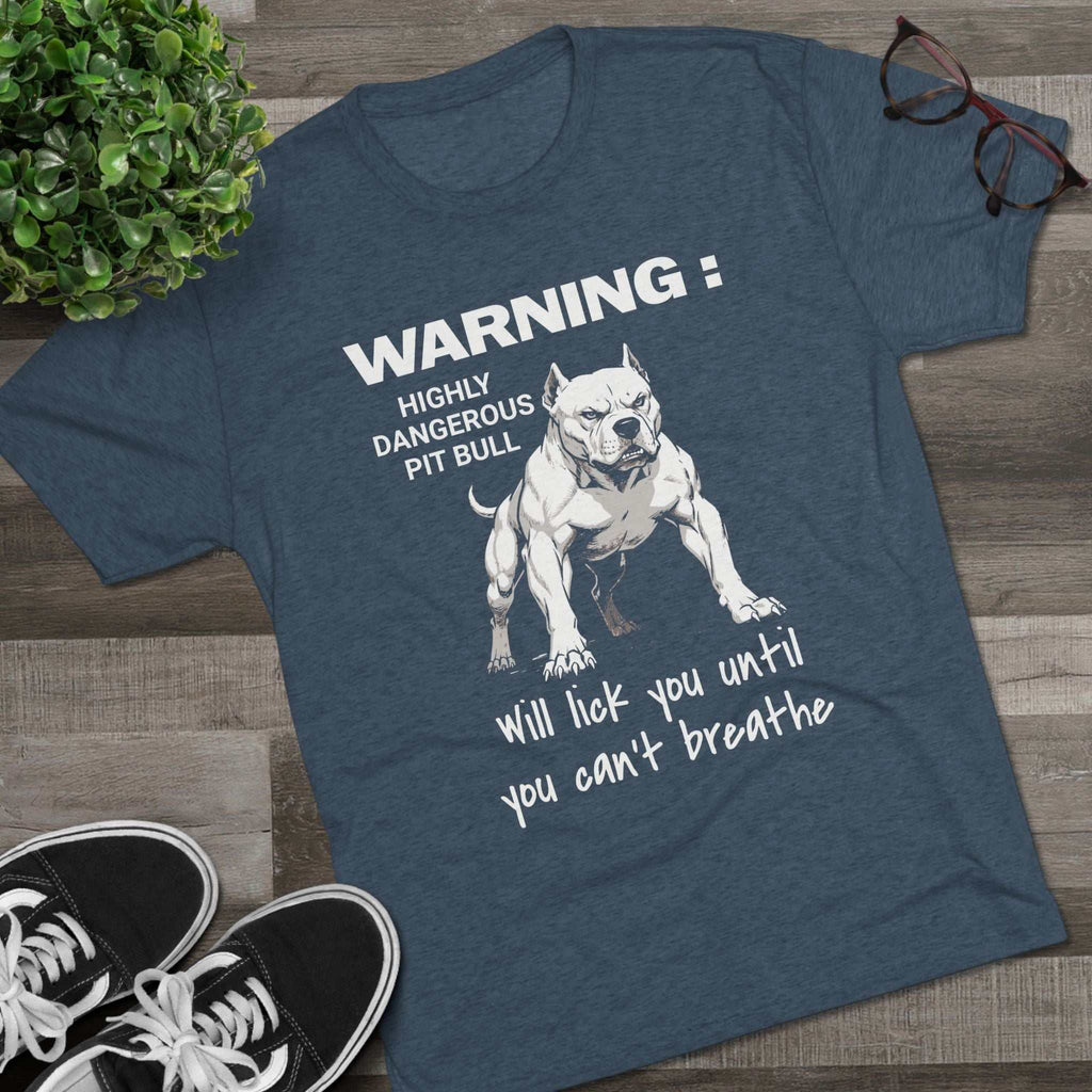 Charcoal Pit Bull Warning T-Shirt with playful "Highly Dangerous Pit Bull Will Lick You Until You Can't Breathe" text and detailed pit bull illustration