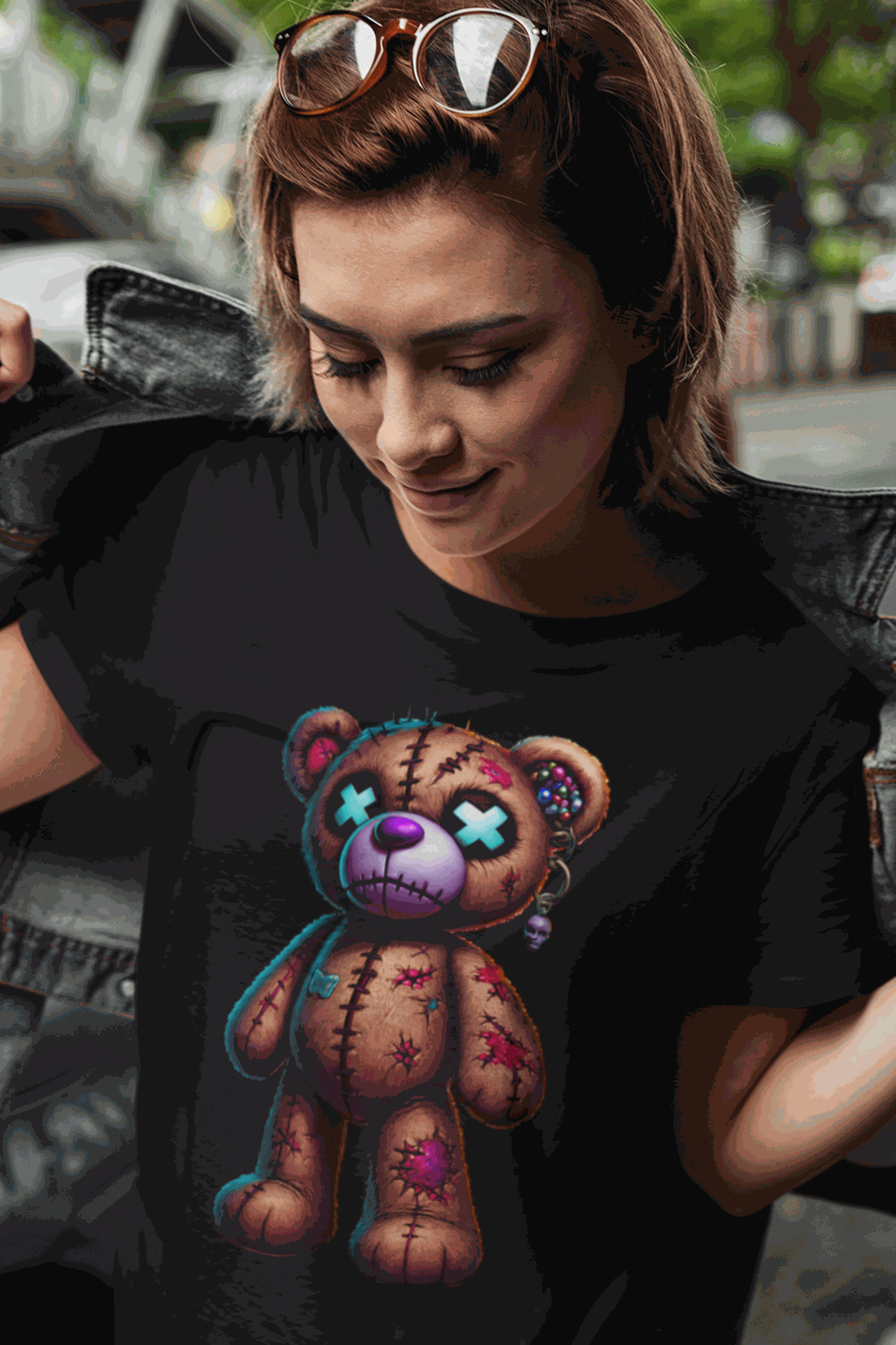 Woman wearing black cute graphic teddy bear tee with colorful stitched teddy bear design