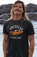 Man wearing black American Classic Cars Daytona T-Shirt with vintage car graphic and text.