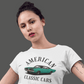 Woman wearing white American Classic Cars 69 Charger unisex tri-blend crew tee with green vintage car graphic