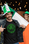 Man wearing St. Patrick's Day Lucky and Blessed shamrock tee with green and white hats and Irish flag background